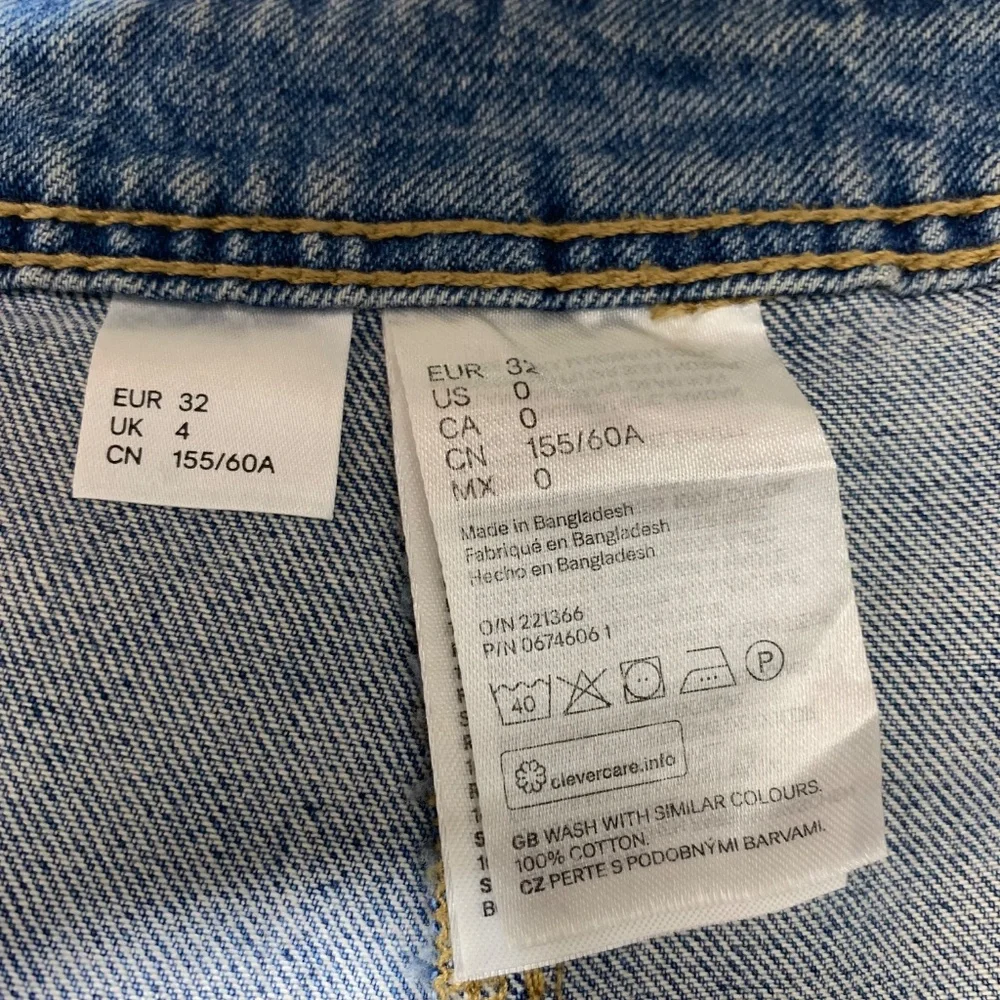 H&M Divided Denim Mini Skirt Womens Size 0 Blue Button Front High Waisted A-Line